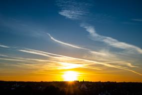 sunset on the city skyline at dusk