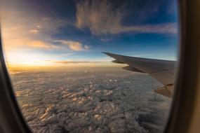 window Plane Sunset