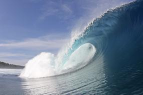 photo of a big wave on the coast of Indonesia