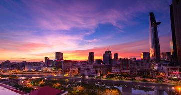 Cityscape of Saigon, Vietnam, with the colorful lights, at beautiful and colorful sunset