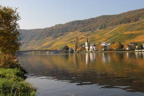 church by the river near the hill