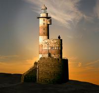 Beautiful landscape of the lighthouse on the cliff, at beautiful, orange sunset in the sky