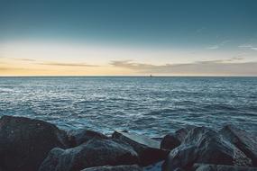 stones on the seaside at dusk