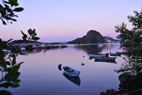 Pink twilight over idyllic scenery on the lake