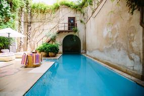 pool with blue water in the guest house