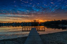 Beautiful shore of the lake, in the park, at beautiful and colorful sunset