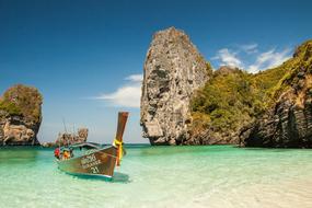 boat in the lagoon of a tropical island