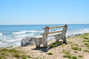 bench on the beach on a sunny day