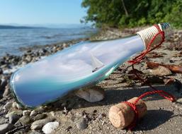 Sailing Boat Bottle on Seashore