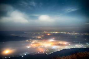 Beautiful landscape of Aso, Kumamoto, in Japan, with the colorful lights, at the night