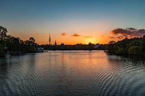 Beautiful Alster, at colorful sunset in the sky, in Hamburg, Germany