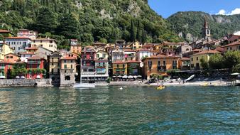 houses on the coast of lake como on a sunny day