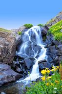 Beautiful landscape of the rocky waterfall, among the colorful plants on KaÃ§kars in Turkey