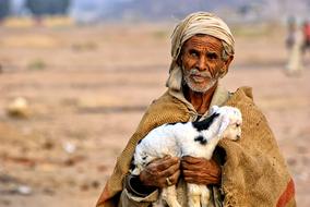 Egypt Man and small goat