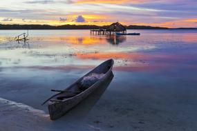 fishing boat on beach At Dusk, indonesia, halmahera island