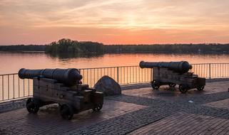 sunset over historic cannons in berlin