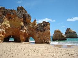 rocks on the beach near the mediterranean sea in portugal