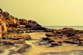 rocky coastline with erosion near the sea in cyprus