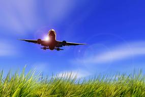 aircraft flight sky and green grass