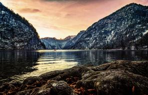 Beautiful and colorful landscape with the Upper Lake, among the mountains in KÃ¶nigssee, Bavaria, Germany, at beautiful and colorful sunset