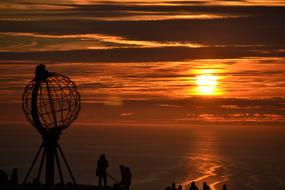 orange sunset over norway coast