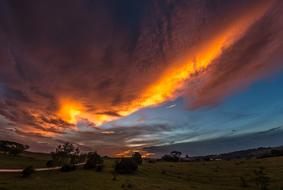 dramatic sunset over countryside