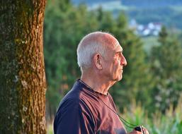 Senior Man and tree
