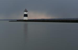 distant view of the lighthouse in the evening