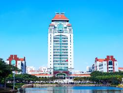 Colorful buildings, on the beautiful beach, with the green plants, in Xiamen, China, at blue sky on background