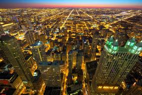 Cityscape of Chicago city, with the colorful lights, at beautiful and colorful, gradient sunset