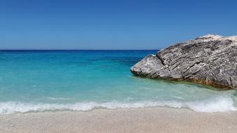 Mediterranean Turquoise Sea and stone