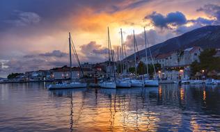 evening photo of sailing boats in the harbor in Croatia