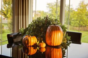 design with pumpkin on the table in the house