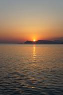 Beautiful landscape with the mountain, on the shore, at beautiful and colorful, gradient dawn