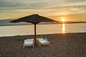 Beautiful sea beach at colorful dawn in Croatia