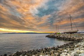 boat on the stone coast in the port
