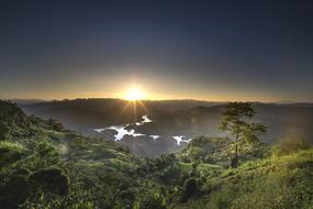 Beautiful landscape of the mountains with colorful plants, in fog, in colorful sunrise, in Na Hang, Tuyen Quang, Vietnam