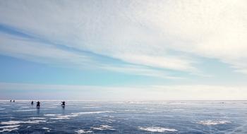Fishermen on the ice of the lake