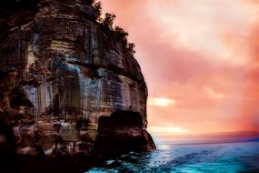 Beautiful landscape with the cliff, in Lake Michigan, at colorful sunrise