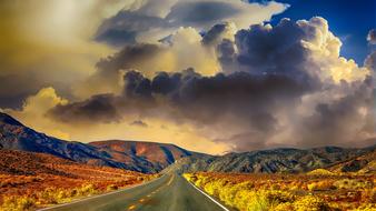 Beautiful panoramic landscape with the colorful mountains under cloudy sky