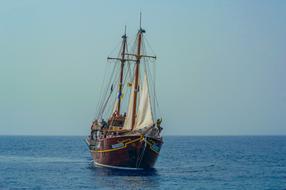 Beautiful waterscape with the ship on the blue ocean