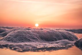 purple foamy waves under pink sky, usa, South Carolina, myrtle beach