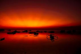 colorful sunset over the harbor in indonesia