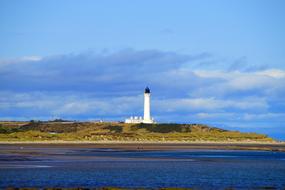 distant view of Covesea Skerries Lighthouse, uk, scotland