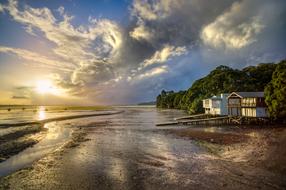 House on Beach Shore at sunset
