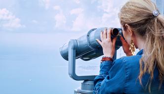 Girl with Binoculars on Sea