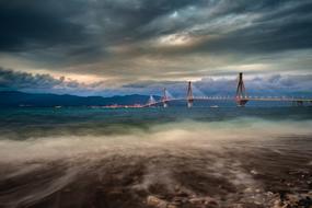 distant view of the Rio Antirio bridge in a storm