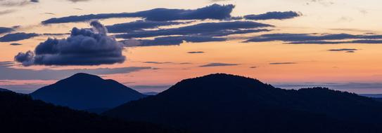 Beautiful landscape with silhouettes of the mountains in Shenandoah National Park in Virginia, USA, at colorful and beautiful sunrise with clouds