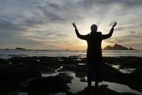 landscape of man on Water Sea at Sunset