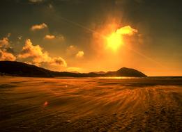 hot sandy beach at dusk